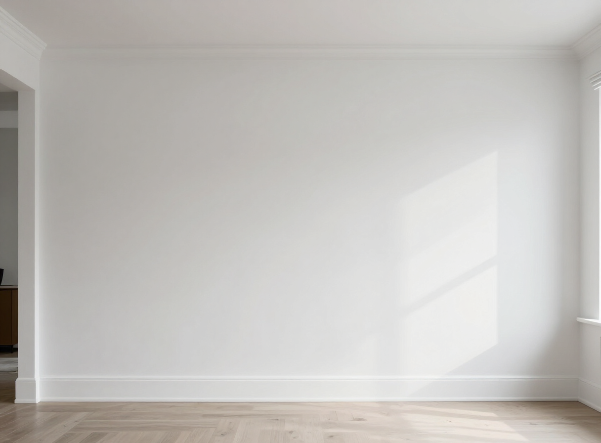 Finished living room with flawless level 5 smooth drywall walls in soft white