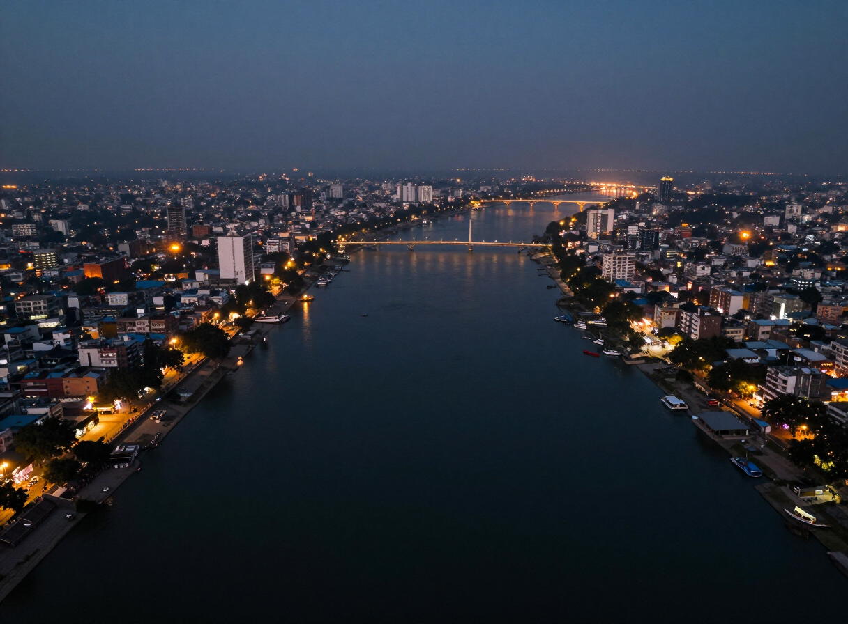 Aerial drone survey view over the Ganga and Patna skyline at dusk
