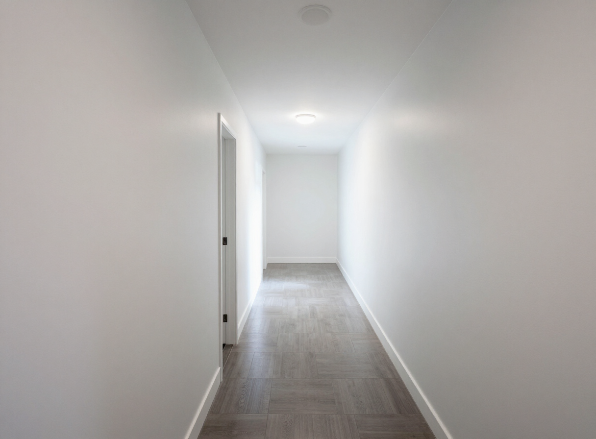 Multifamily building hallway in Union City NJ after drywall repair and painting