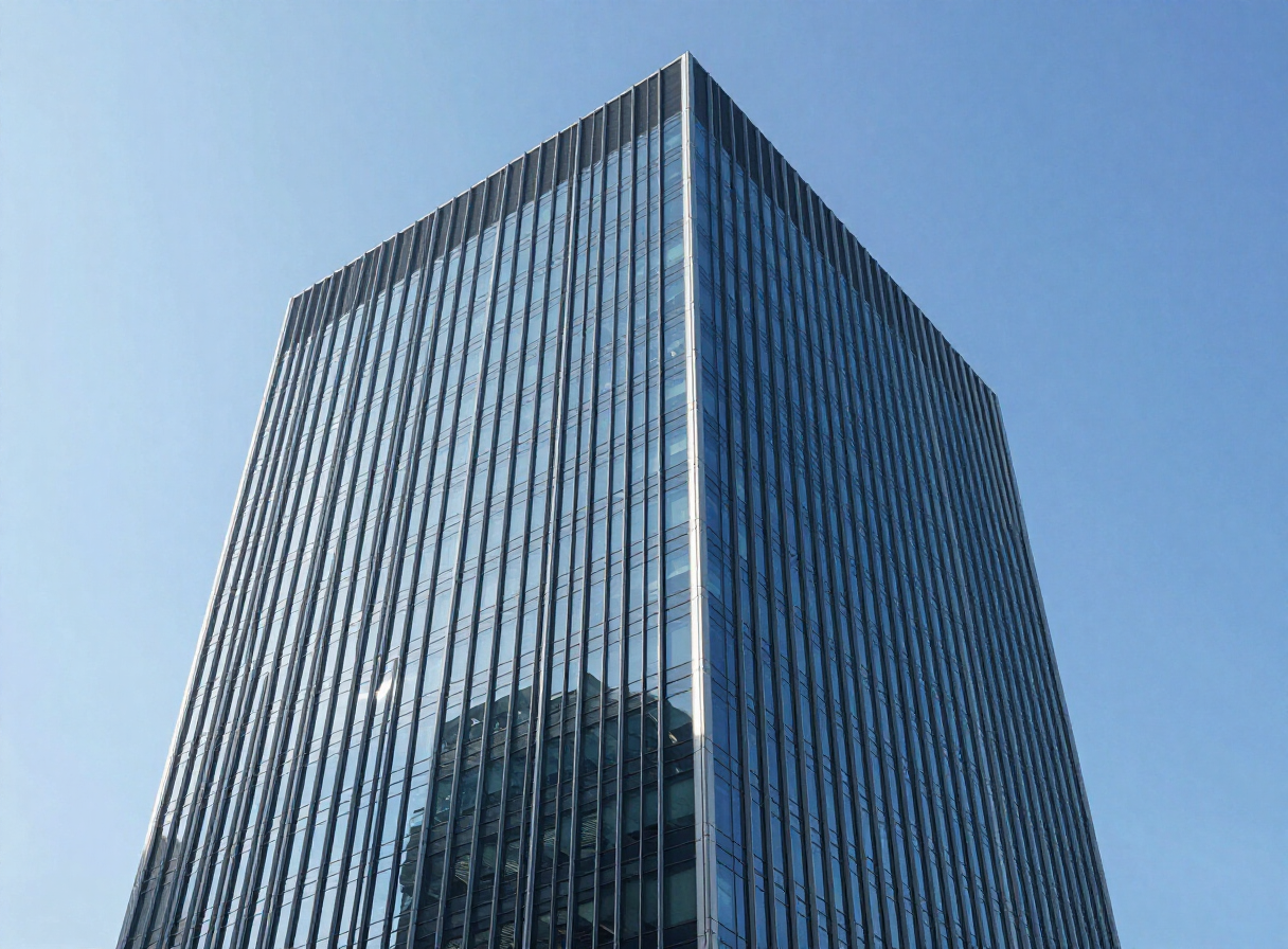 Modern corporate office tower in bright daylight