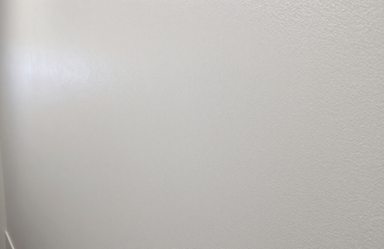 Commercial-grade eggshell finish detail in a West New York common area