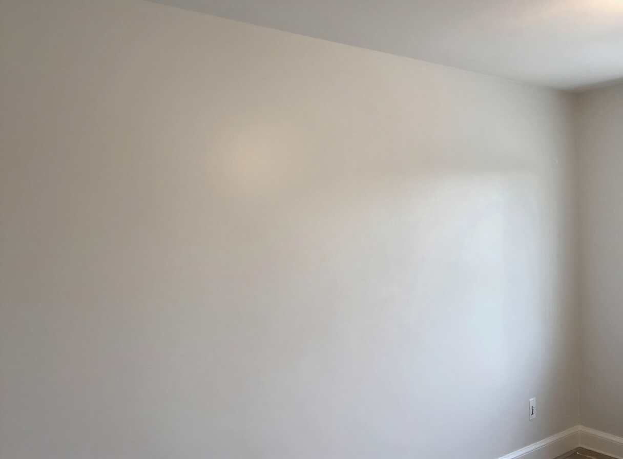 Skim-coated wall after sanding in a Weehawken NJ home, ready for primer