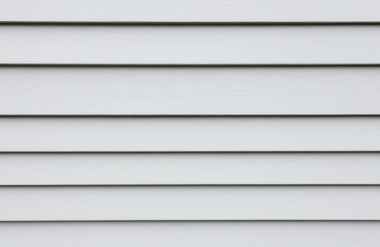 Wind-exposed Secaucus siding after refresh with durable weather-resistant paint