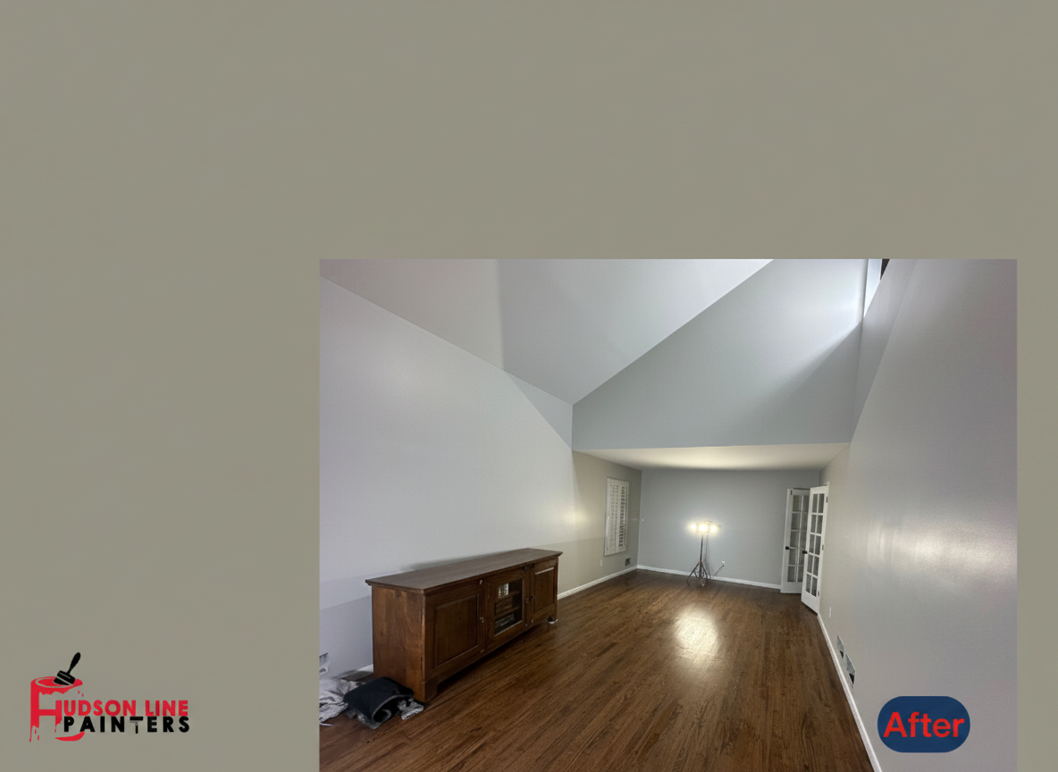 Fort Lee living room after painting - light gray walls with dark hardwood flooring