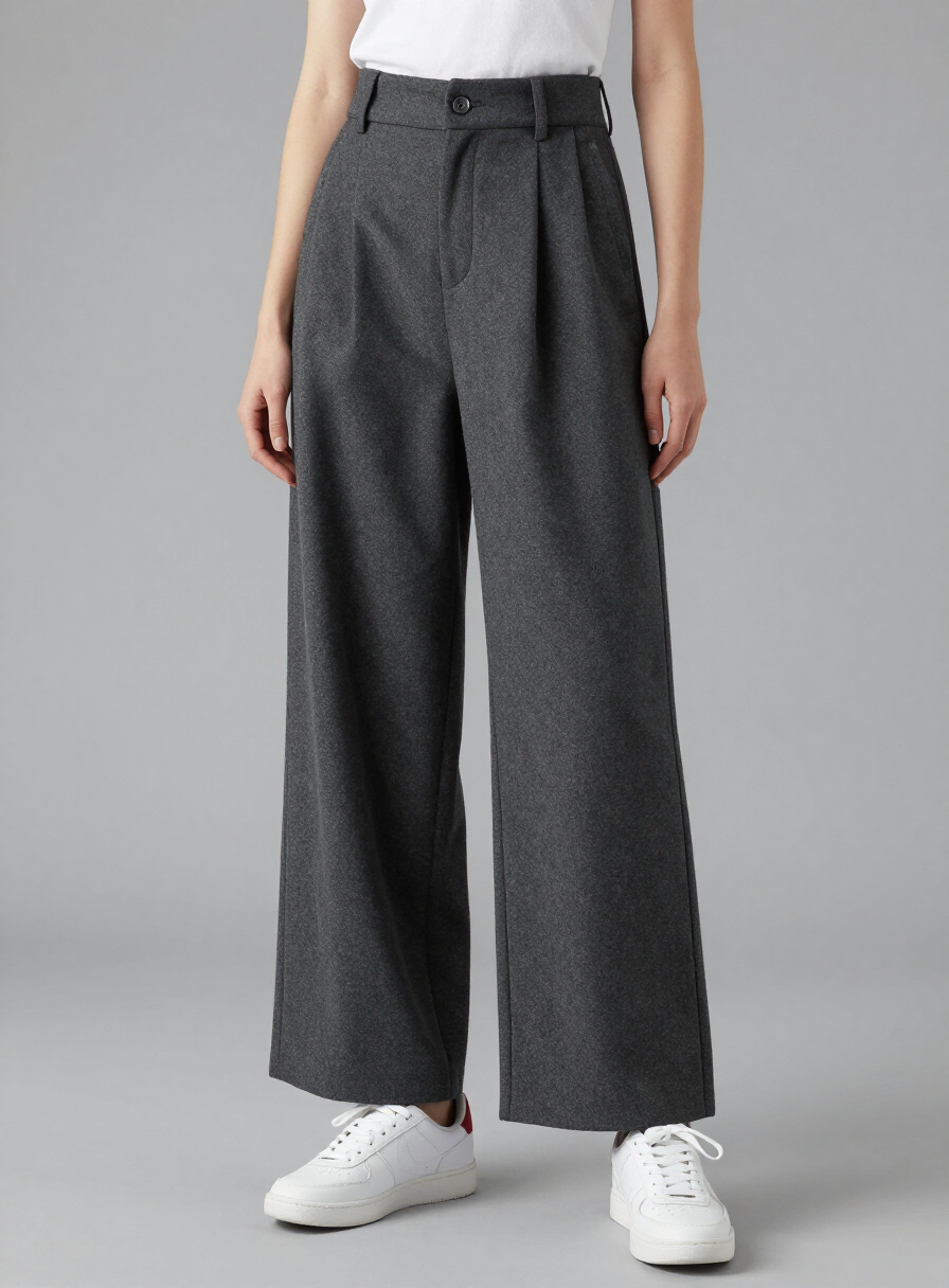 Model wearing wide-leg charcoal pleated Sounding Trousers
