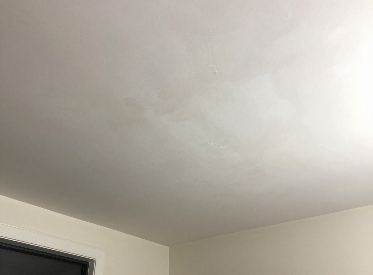 Finished painted ceiling in a Hoboken NJ brownstone after water damage repair