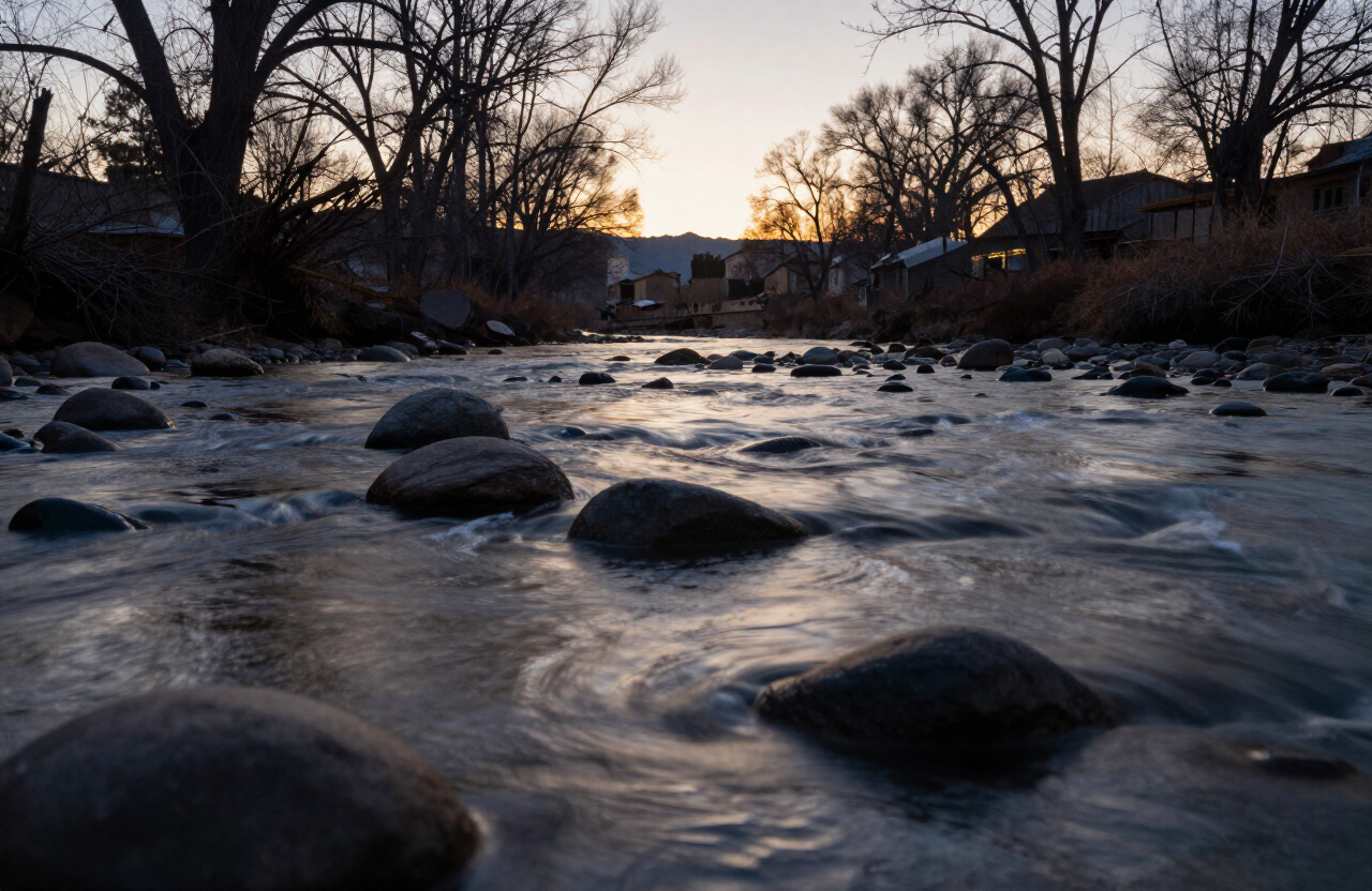 The river at dusk, the same bend as dawn.