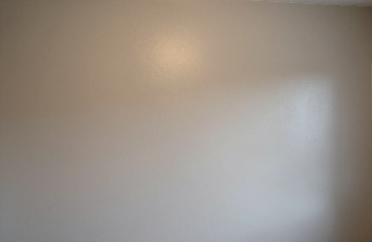 Skim-coated wall after sanding in a Palisade Park NJ home, ready for primer
